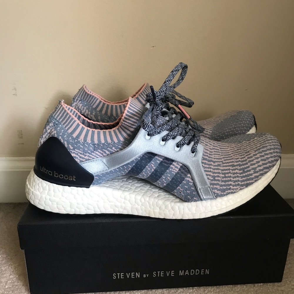 Pink and blue adidas ultra boost